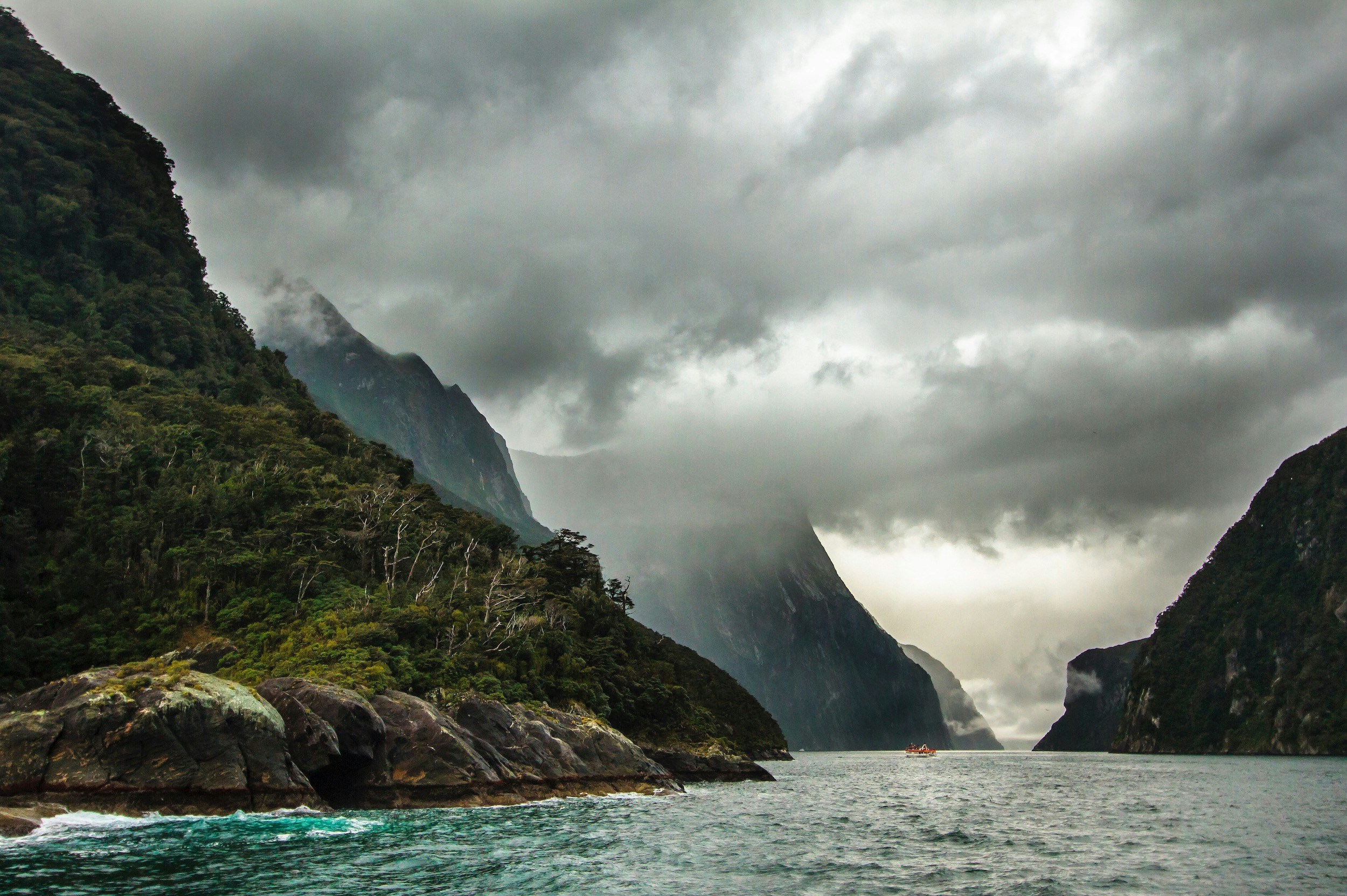 discover the stunning beauty of fjords - a must-see natural wonder with its sheer cliffs and tranquil waters.