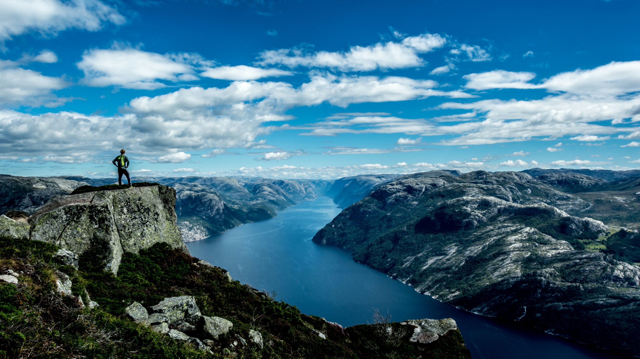 explore the stunning natural beauty of norway's fjords with their towering cliffs, crystal clear waters, and picturesque landscapes.