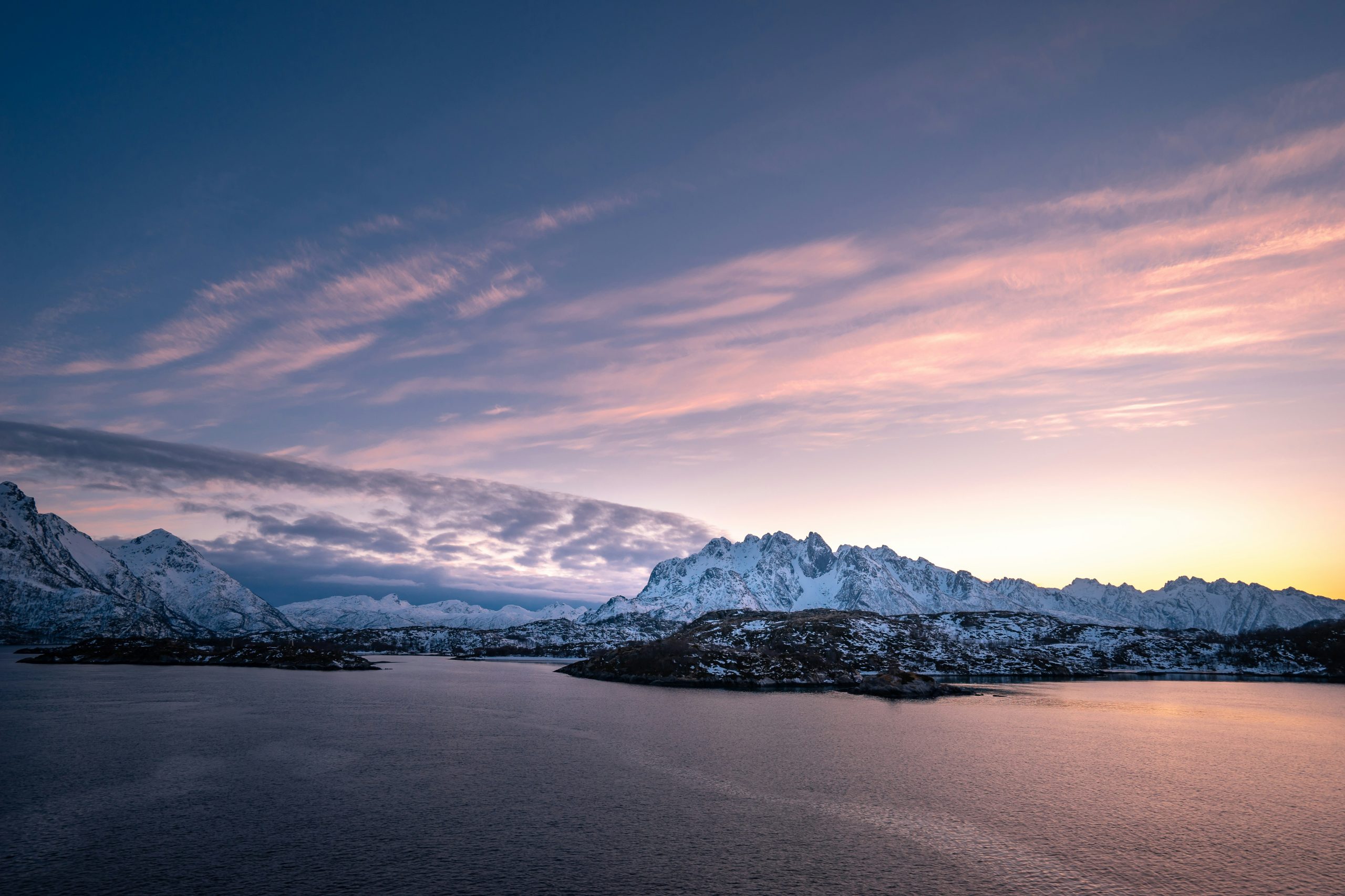 discover the stunning beauty of norway's fjords, with their majestic cliffs, crystal clear waters, and picturesque villages nestled in the valleys.